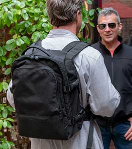 man wearing bulletproof backpack by Bodyguard